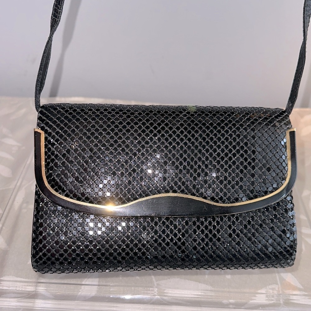 Black & gold chain clutch.